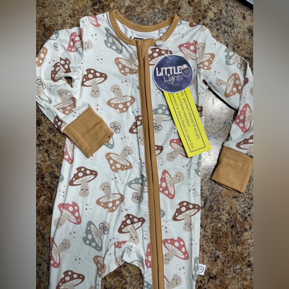 Bamboo zippy romper with feet grips. Every size available. NWT